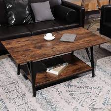 Photo 1 of Coffee Table with UndershelfCO-Z 47" Industrial Coffee Table with Storage Shelf, Wood and Metal Legs for Living Room, 2-Tier Accent Cocktail Table, Easy Assembly, Rustic Brown
