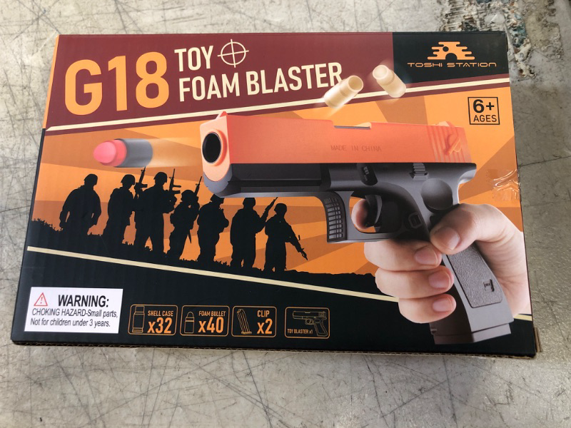 Photo 1 of G18 TOY FOAM BLASTER GUN 