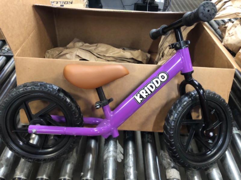 Photo 1 of purple strider bike