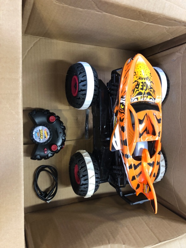 Photo 2 of Hot Wheels Monster Trucks, Remote Control Car, Monster Truck Toy with All-Terrain Wheels, 1:15 Scale Unstoppable Tiger Shark RC