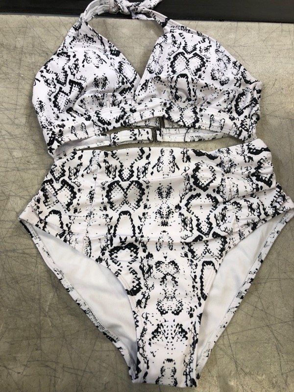 Photo 1 of 2 PIECE BATHING SUIT- BLACK/WHITE
SIZE- M 