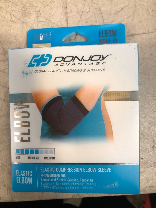 Photo 2 of DonJoy Advantage DA161ES01-TAN-M Elastic Elbow Sleeve for Strains, Sprains, Swelling, Panels for Free Movement, Tan, Medium fits 9", 10.5" Medium fits 9"-10.5"