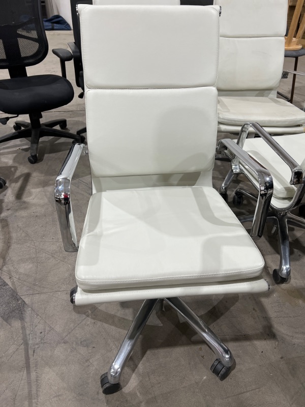 Photo 1 of white leather office chair metal arms