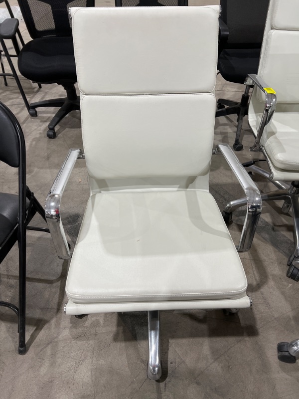 Photo 1 of white leather office chair metal arms