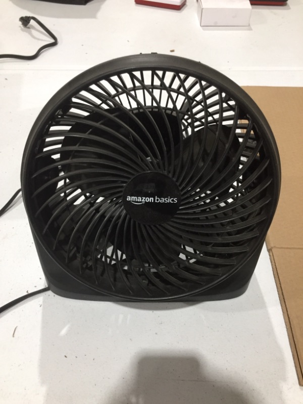 Photo 1 of Amazon Basics 3 Speed Small Room Air Circulator Fan, 7-Inch Blade, Black, 6.3"D x 11.1"W x 10.9"H
