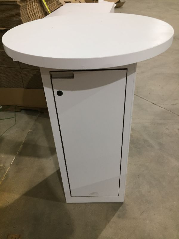Photo 1 of round white standing height table with storage