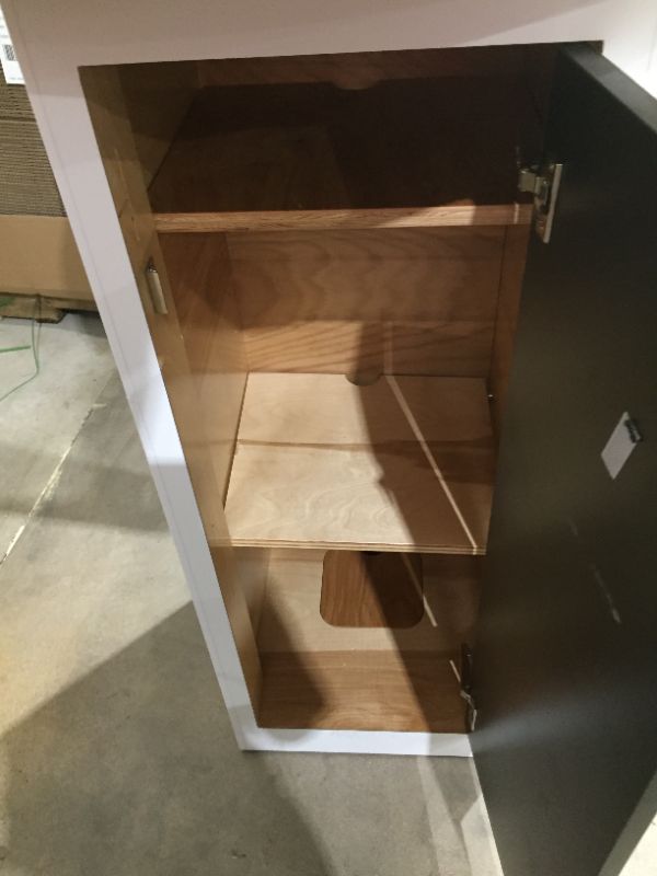 Photo 1 of round white standing height table with storage