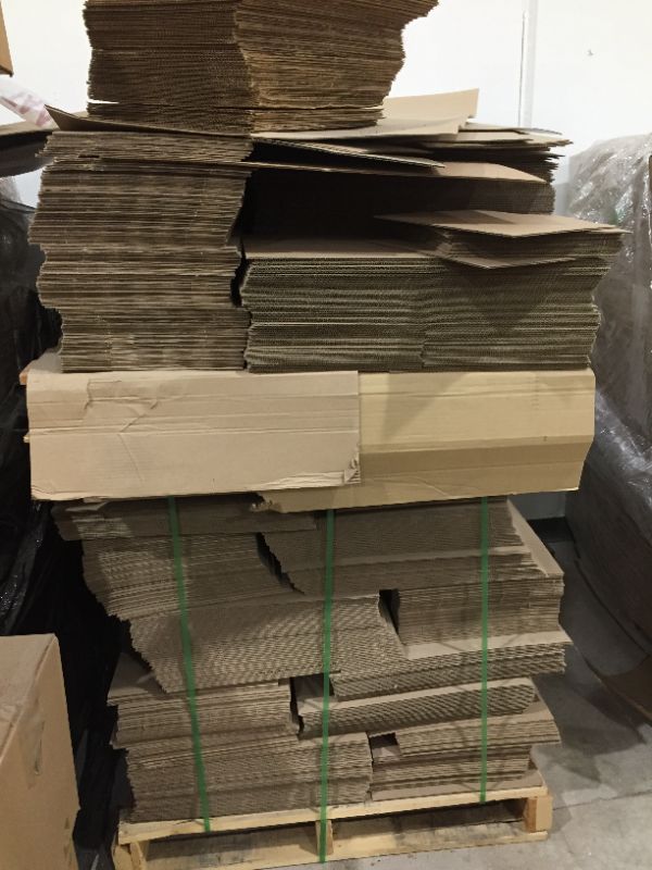 Photo 1 of double stacked pallet of cardboard inserts
see picture for detail