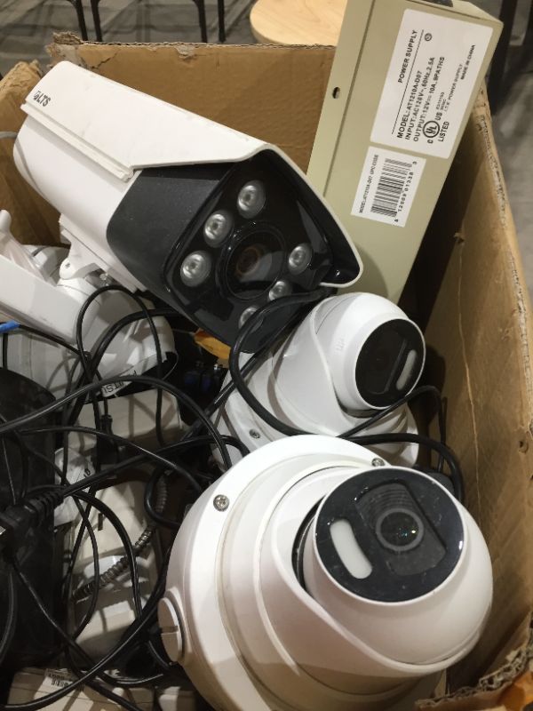 Photo 2 of security camera bundle system
includes 4 cameras 