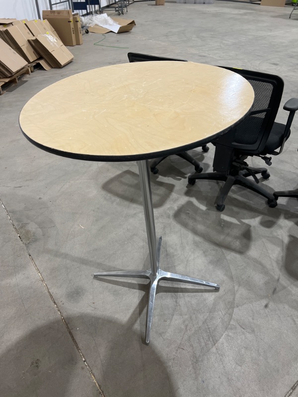 Photo 1 of Standing height table 