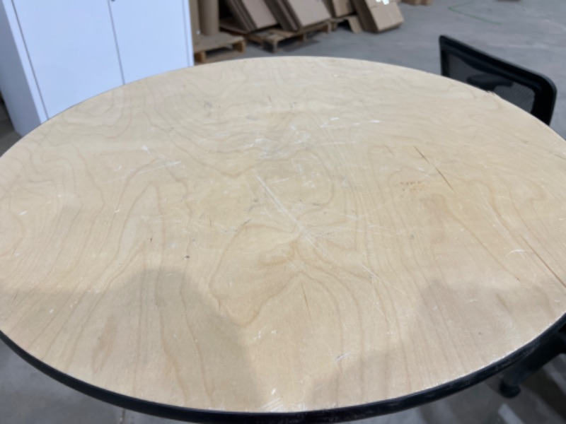 Photo 1 of Standing height table 