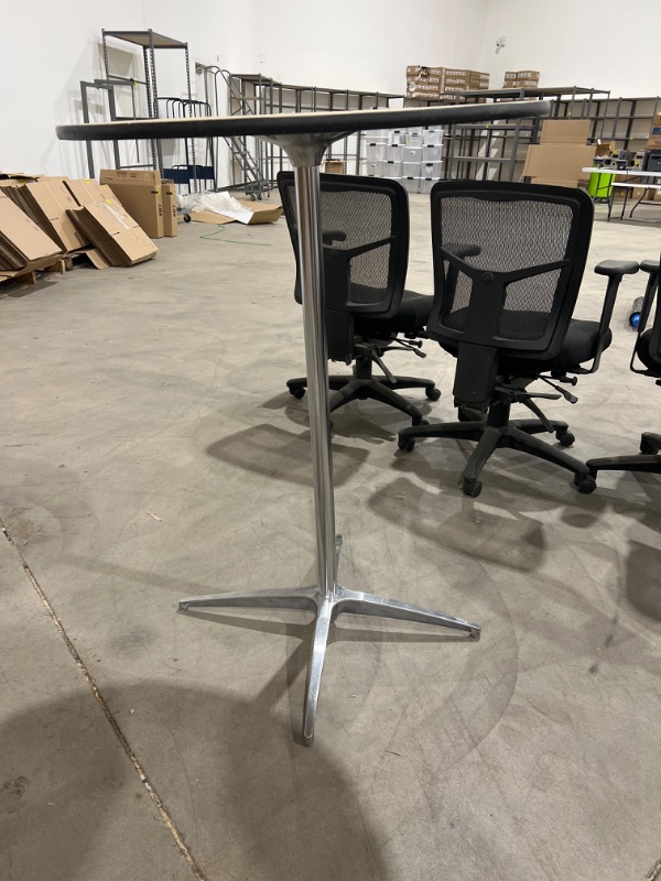 Photo 1 of Standing height table 