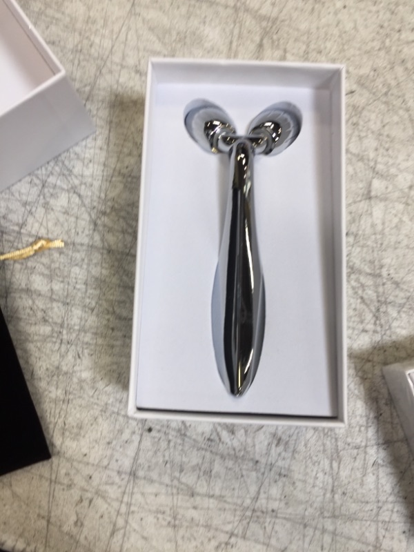 Photo 1 of DANGSHAN Face Body Roller Massager, 3D Roller Face Massager Y-Shape Face Lift Tool Firming Beauty Massage Body Face Massager (Silver)