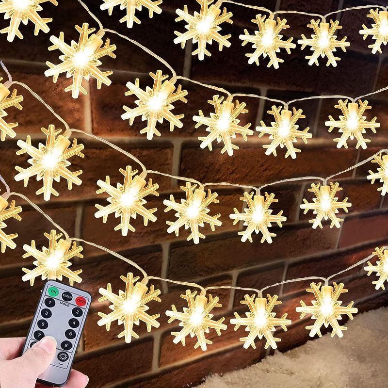 Photo 1 of [ Timer + 8 Modes ] Christmas Snowflake Lights Decor, 40 LED 16.4 Ft Fairy String Lights Remote Waterproof Battery Operated Christmas Tree Lights Decoration Indoor Outdoor Home Bedroom (Warm White)
