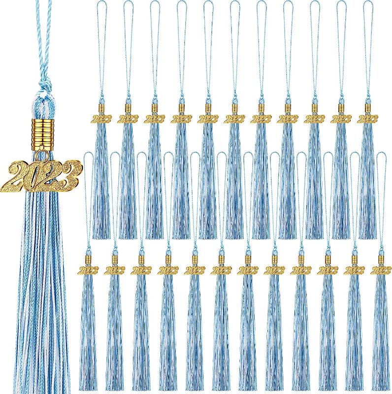 Photo 1 of 24 Pieces Graduation Tassels with 2023 Year Date Charms Grad Graduation Cap Tassel Graduation Hat Decoration for 2023 Graduation Gifts Party Activities, 16.2 Inch (Sky Blue, White, Gold)
