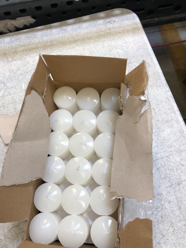 Photo 1 of 36 PC SMALL  WHITE CANDLES 