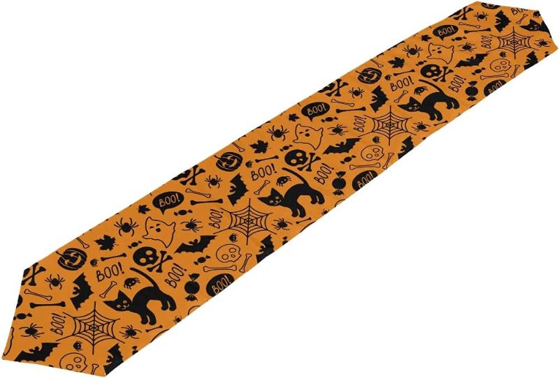 Photo 1 of ALAZA Orange Halloween Cat Pumpkins Skulls Table Runner Cover for Family Dinner,Wedding Christmas Party Holiday Decor,Farmhouse,13 x90 Inches,Machine Washable
