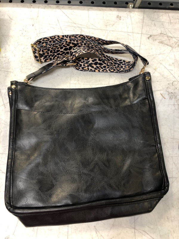 Photo 1 of BLACK BAG WITH LEOPARD STRAP 