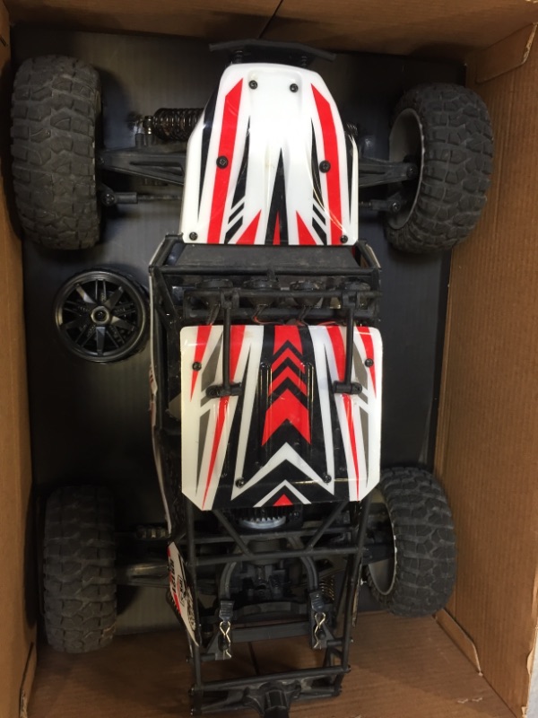 Photo 2 of BEZGAR HB121 Hobby Grade 1:12 Scale RC Trucks, 4WD High Speed 45 Km/h All Terrains Electric Toy Off Road Sand Rall Buggy RC Truck RC Monster Car with Rechargeable Batteries for Boys Kids and Adults White.