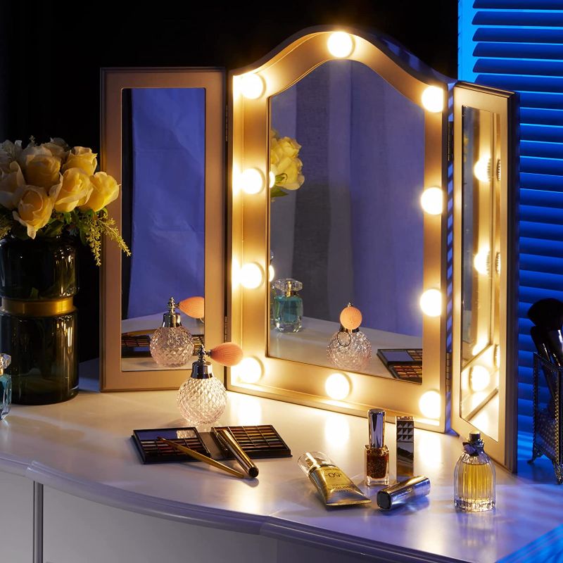 Photo 1 of 
LUXFURNI Vanity Lighted Tri-fold Makeup Mirror with 10 Dimmable LED Bulbs, Touch Control Lights Tabletop Hollywood Cosmetic Mirror (Rose Gold)
Color:Rose Gold