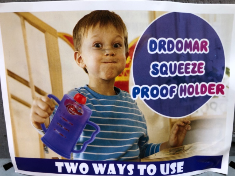 Photo 1 of  Squeeze Proof Flipping Holder (with lid) for Food Pouches & Juice Boxes - Multipurpose - Prevent Messes & Support Self-Feeding - Easy Grasping Handles - Made in US