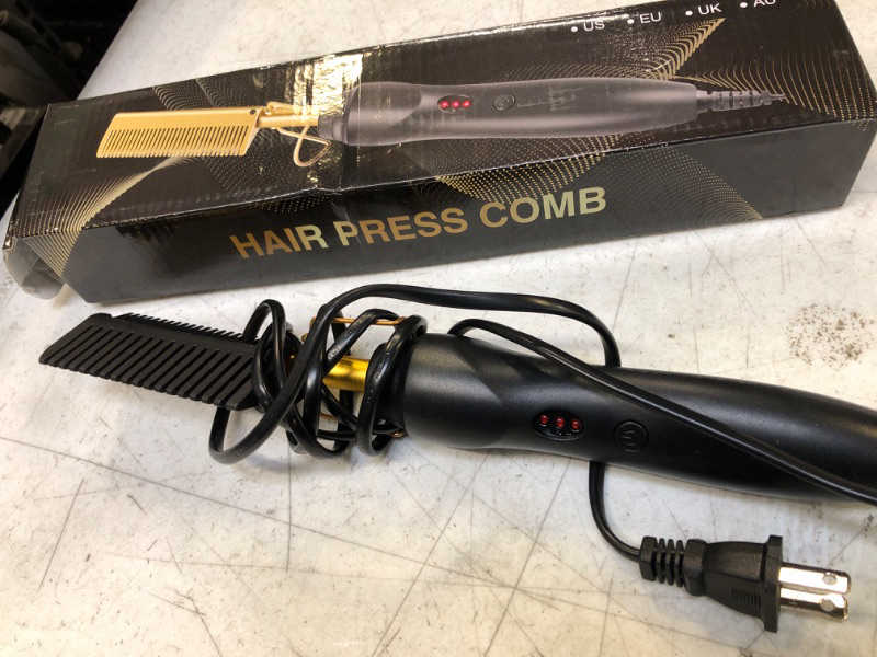 Photo 1 of HAIR PRESS COMB