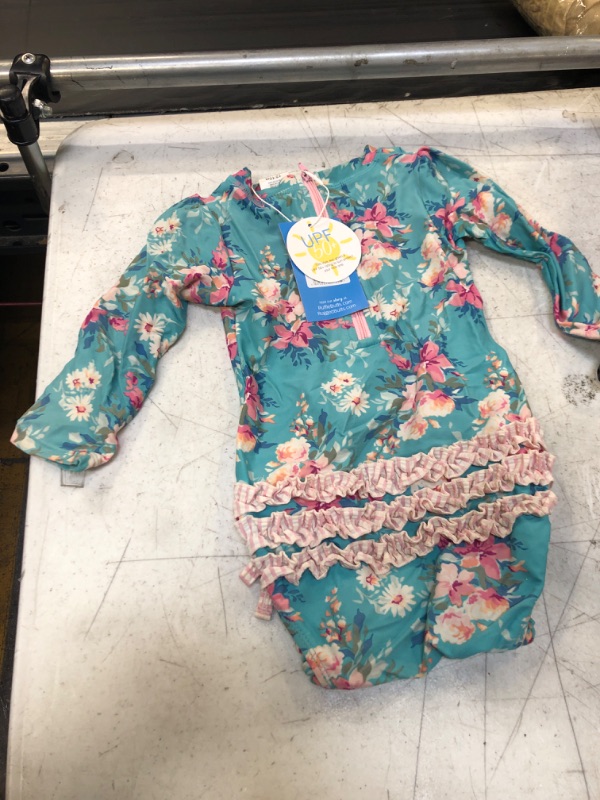 Photo 1 of Girl's Rosy One-Piece Long-Sleeve Rash Guard, Size Newborn
SIzE 12-18 M 
