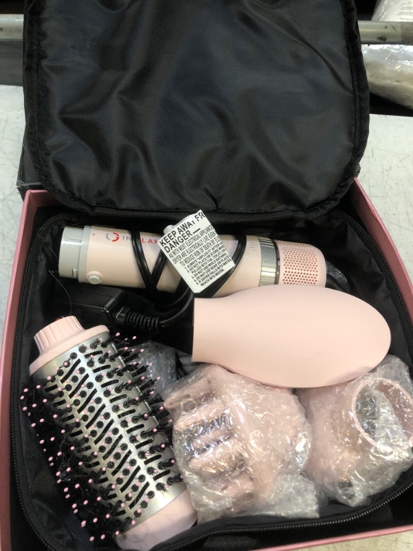 Photo 2 of Hair Dryer Brush Set, IG INGLAM 4 in 1 Blowout Brush, Negative Ion Detachable Hair Dryer & Styler Volumizer Hot Air Hair Dryer Brush with 2 Styling Brush Heads, Pink - Note: Hair in brush 