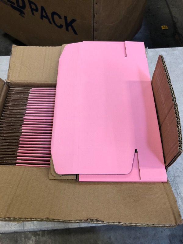 Photo 1 of 30 small pink boxes 