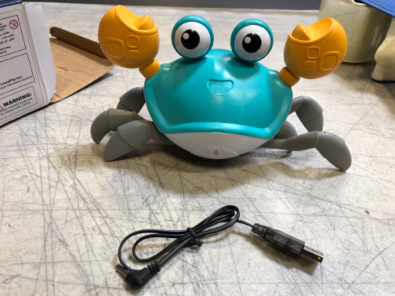 Photo 2 of Crawling Crab Baby Toys with Music and LED Light for Kids Toddles - Interactive Infrared Induction RC Toys with Automatically Avoid Obstacles - USB Rechargeable Electronics Toys for Boy and Girl Gift
