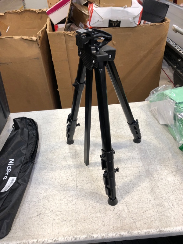 Photo 1 of Black tripod for camera 