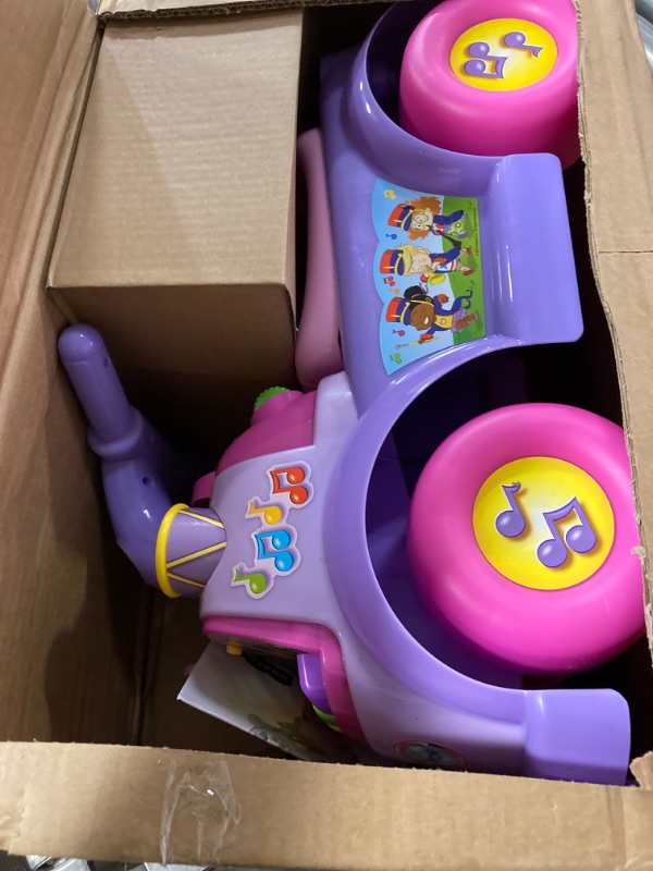 Photo 2 of Fisher Price Music Parade Purple Ride-On with 5 Different Marching Tunes! [Amazon Exclusive]