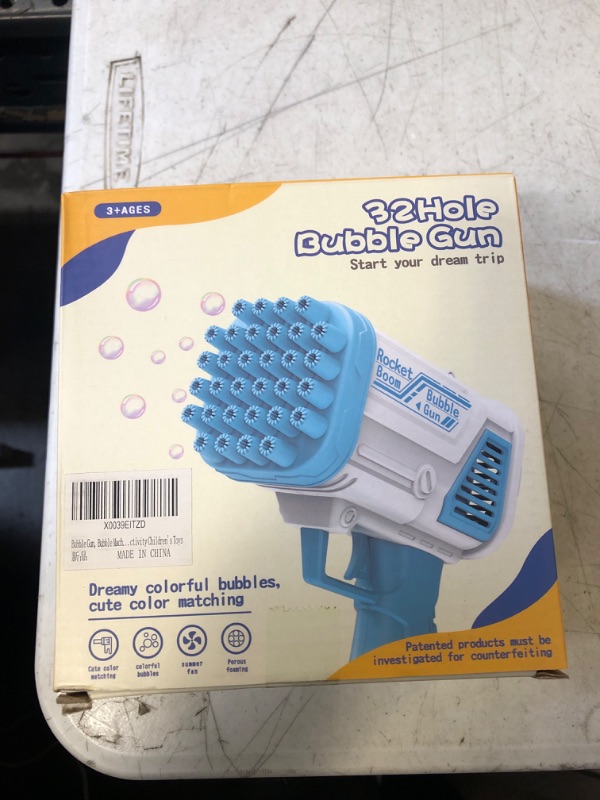 Photo 1 of Bubble Gun Bazooka, Bubble Machine 32 Hole Rich Bubbles, Bubble Blaster, Bubble Blower, Rocket Boom Bubble Machine Gun for Kids Toddlers, Party Favors Birthday Gift Blue