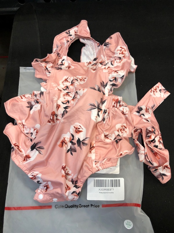 Photo 1 of GIRLS PRETTY PINK ONE PIECE SIZE 6-9 MONTHS