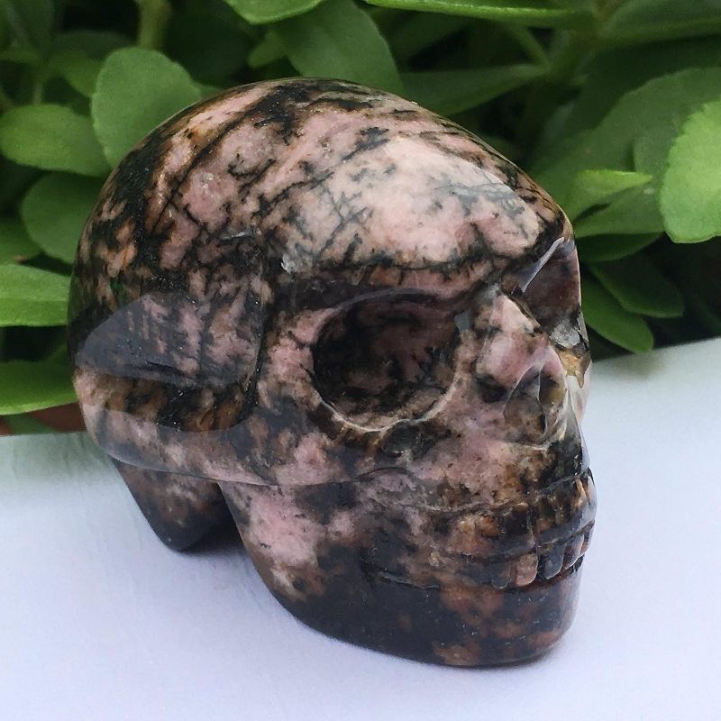 Photo 1 of  2 inches Natural Quartz Crystal Indian Hand Carved Skull Crystal Gifts Halloween (Rhodonite Jasper)
