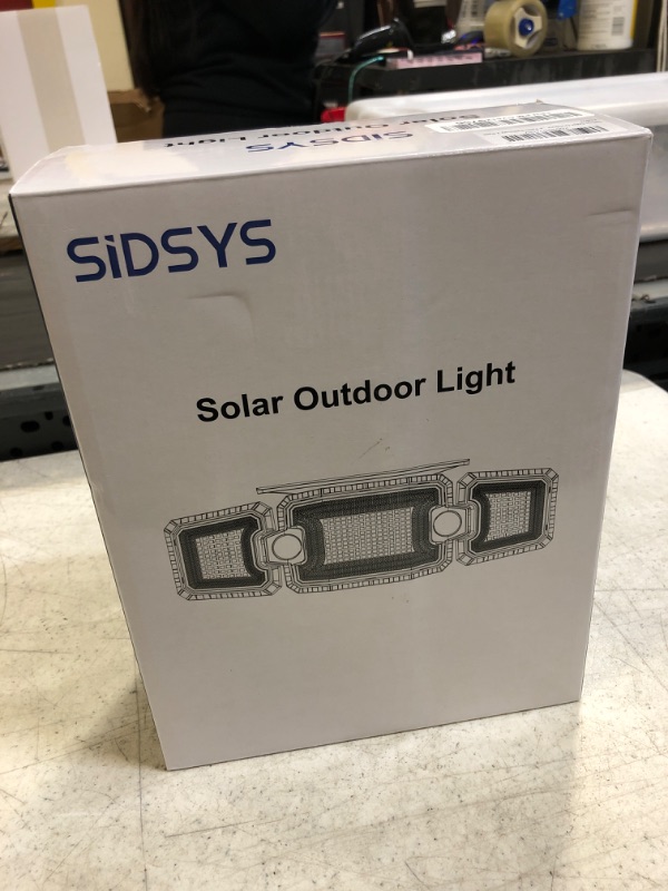 Photo 2 of SIDSYS Solar Outdoor Lights, IP65 Waterproof Floodlights, 3 Lighting Heads 7300LM 305 LED Adjustable Security Spotlight with 2 Motion Sensors for Garden Yard Garage Patio Pathway 2 Pack