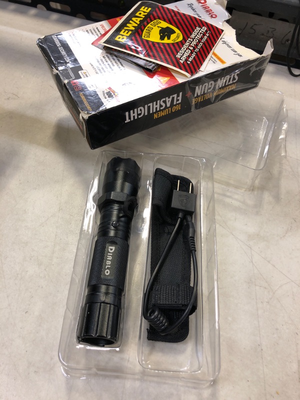 Photo 2 of Guard Dog Diablo Tactical Stun Gun Flashlight, Maximum Voltage, Ultra Bright LED Bulb, Rechargeable Black