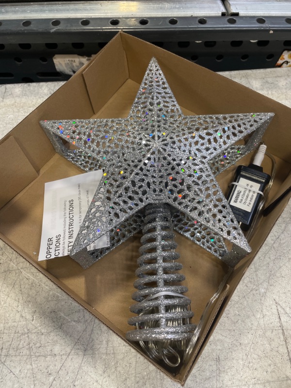 Photo 2 of Christmas Tree Star Topper, LED Color Hollow Glitter Projector, 12 in 3D Hollowed Pentagram Tree Topper, Insert Silver Sparkling Christmas Tree Overhead Lights for Family Christmas Tree Decoration
