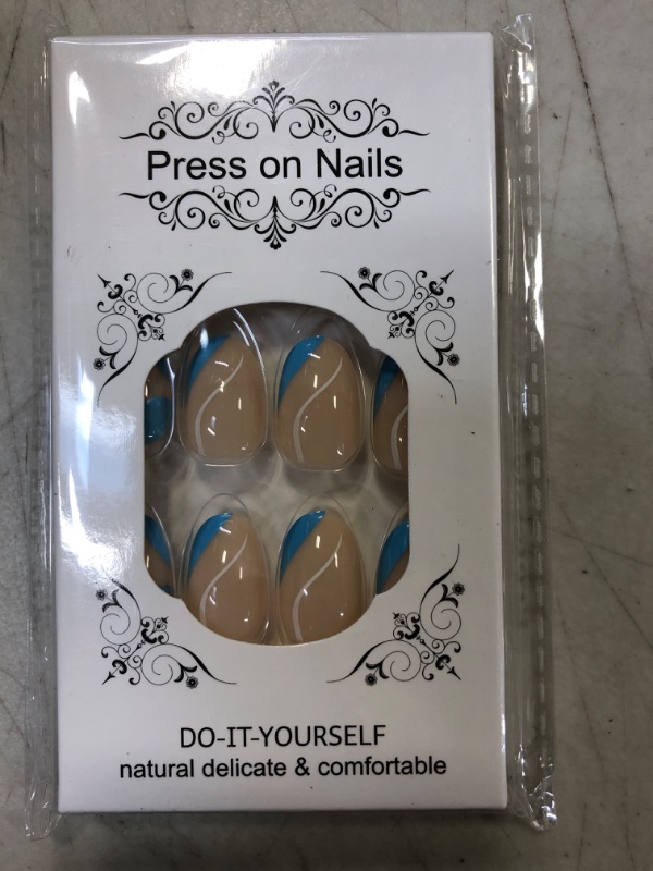 Photo 1 of Hkanlre Blue Almond Press on Nails Swirl Medium Fake Nails Acrylic False Nails Tips Full Cover Nude Nails for Women and Girls 24PCS