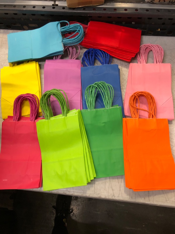 Photo 1 of 10 different color goodie bags * unknown count