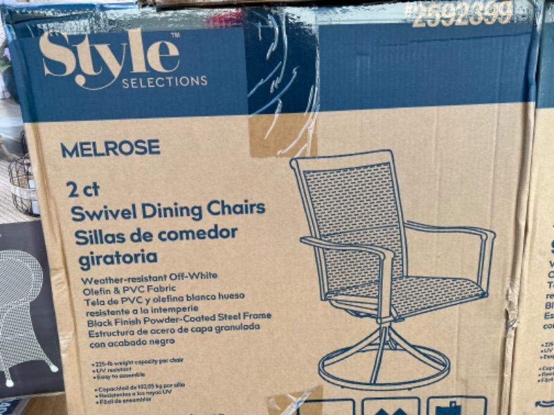 Photo 1 of STYLE SELECTIONS MELROSE SET OF 2 BLACK STEEL FRAME SWIVEL DINING CHAIR(S) WITH OFF-WHITE CUSHIONED SEAT