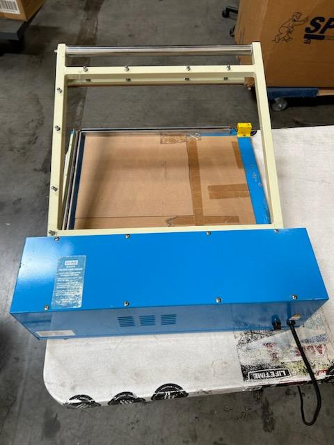 Photo 4 of Deluxe L-Bar Sealer is extremely fast using 1000W power to cut sealing time in half, sealing 6-8 packages per minute. The Deluxe L-Bar Sealer seals and trims up to two 18" sides at once.
Includes 18" film dispenser, film separator, worktable and twin perf