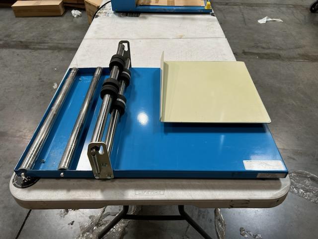 Photo 11 of Deluxe L-Bar Sealer is extremely fast using 1000W power to cut sealing time in half, sealing 6-8 packages per minute. The Deluxe L-Bar Sealer seals and trims up to two 18" sides at once.
Includes 18" film dispenser, film separator, worktable and twin perf