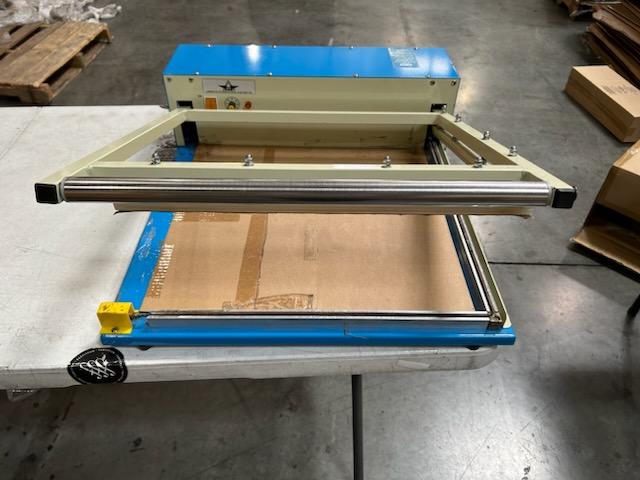 Photo 6 of Deluxe L-Bar Sealer is extremely fast using 1000W power to cut sealing time in half, sealing 6-8 packages per minute. The Deluxe L-Bar Sealer seals and trims up to two 18" sides at once.
Includes 18" film dispenser, film separator, worktable and twin perf