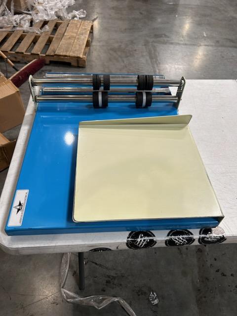 Photo 10 of Deluxe L-Bar Sealer is extremely fast using 1000W power to cut sealing time in half, sealing 6-8 packages per minute. The Deluxe L-Bar Sealer seals and trims up to two 18" sides at once.
Includes 18" film dispenser, film separator, worktable and twin perf