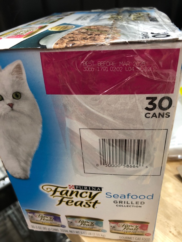 Photo 2 of **DATED MAR 2025**MISSING SOME* Purina Fancy Feast Grilled Seafood Feast Variety Cat Food - 30 pack, 3 oz cans