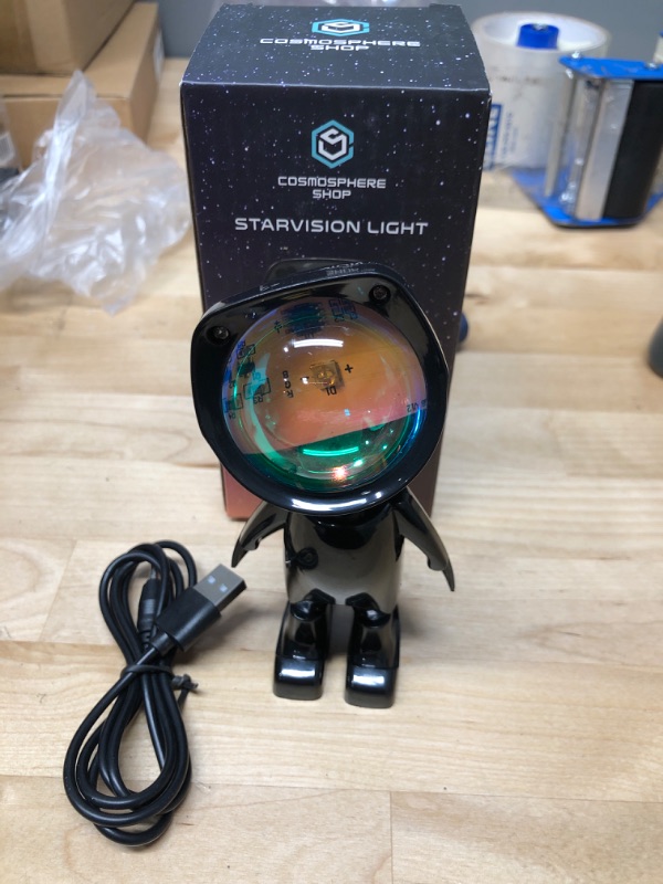 Photo 2 of Cosmosphere StarVision 2.0 Sunset Lamp Projector - 7 Cosmic Colors Sunset Light, Touch Control Sunset Projection Lamp, Adjustable 360°, USB Rechargeable