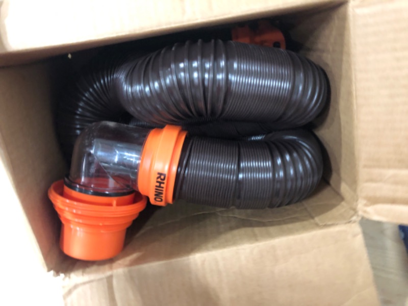 Photo 2 of Camco RhinoFLEX RV Sewer Hose Kit with Swivel Transparent Elbow and 4-in-1 Dump Station Fitting, Brown, 15 Feet (39770) 15ft Sewer Hose Kit Frustration-Free Packaging