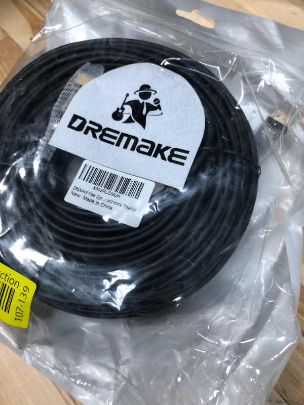 Photo 1 of DREMAKE Fiber Optic HDMI 2.0 Cable 4K@60Hz 18Gbps UHD ARC HDCP2.2 One Direction 50M HDMI 2.0 Cord for PS3/4, Roku TV Box, HDTV, Projector and Home Theather