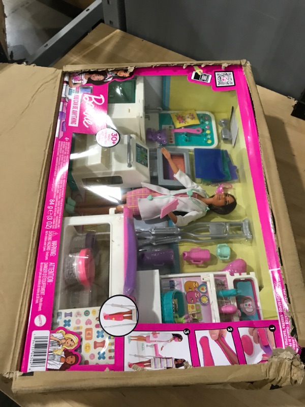 Photo 2 of Barbie Fast Cast Clinic Playset, Brunette Doctor Doll (12-in), 30+ Play Pieces, 4 Play Areas, Cast & Bandage Making, Medical & X-ray Stations, Exam Table, Gift Shop & More, Great Toy Gift